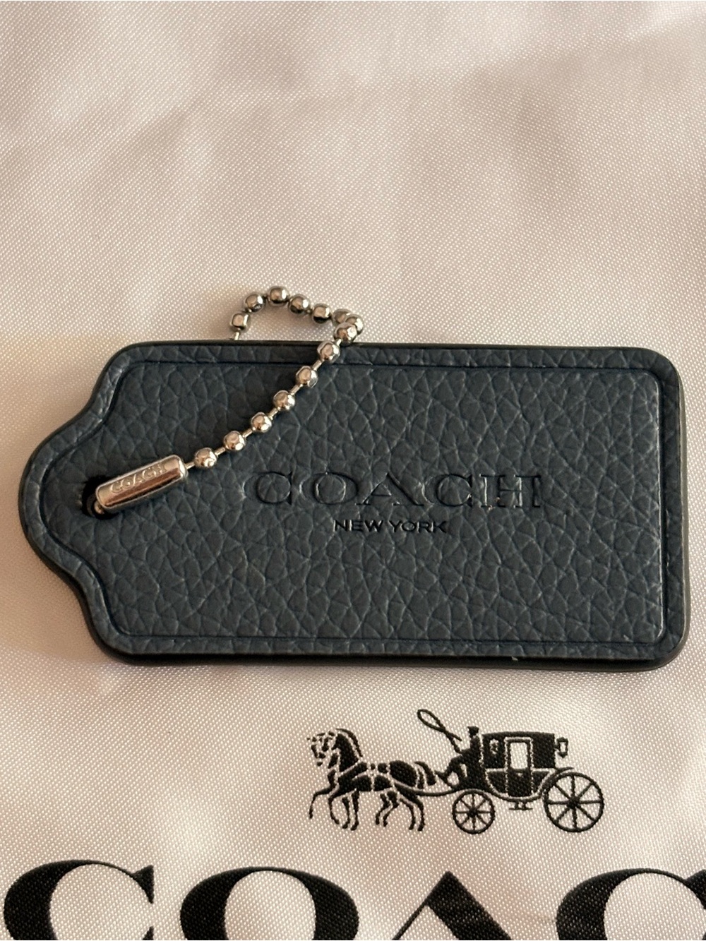 Coach hangtag bag charm